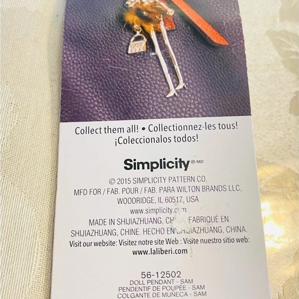 Jolees laliberi doll pendant
